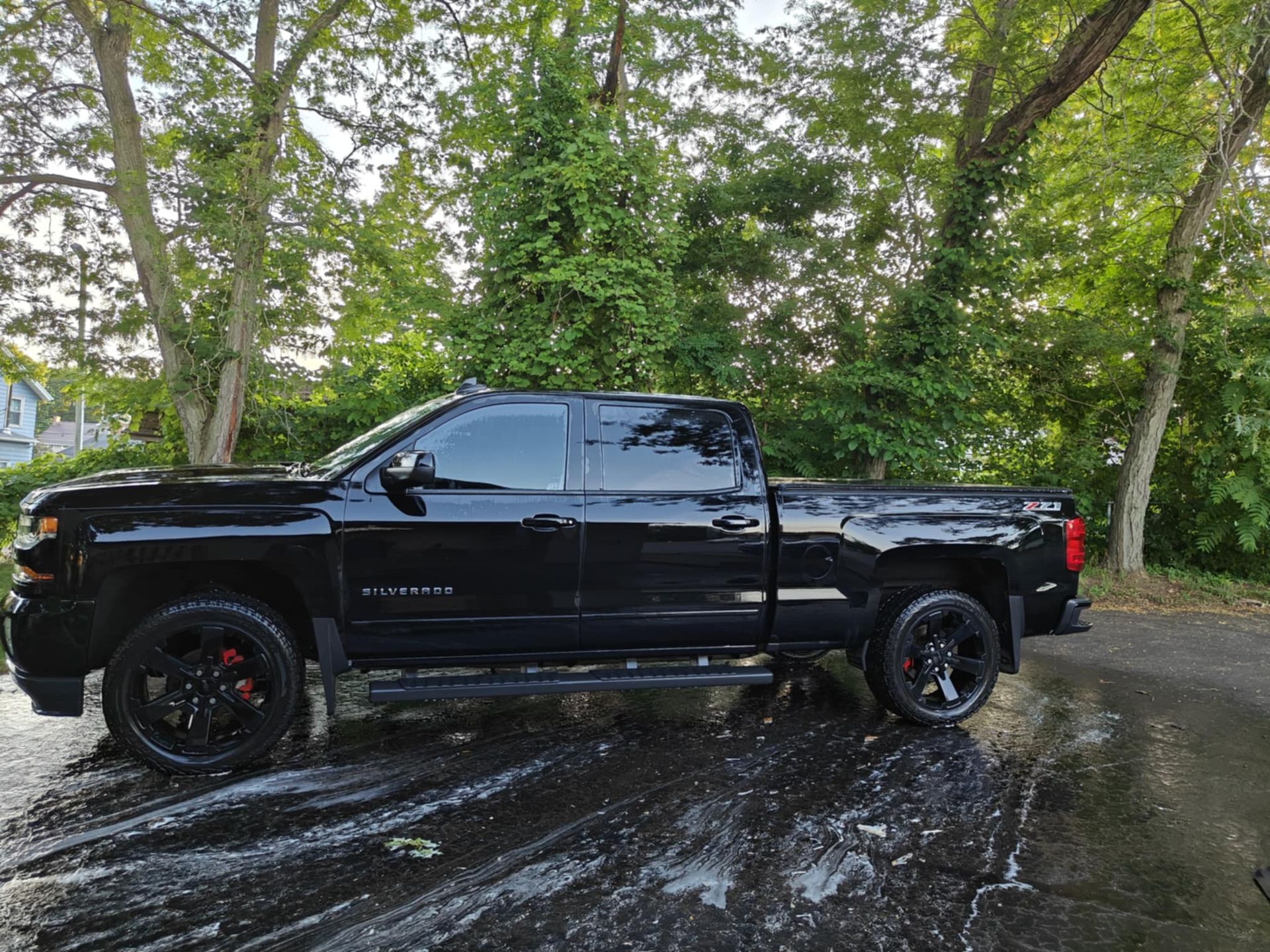 Freshly detailed black Chevrolet Silverado after a Drip Detail Co. wash in Wooster, Ohio